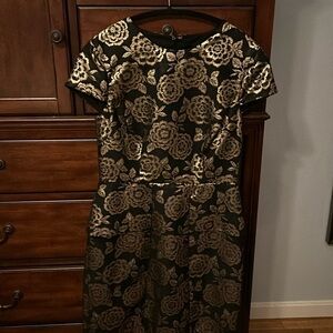 NWT Black and Gold Dress Size 8 runs small more like a size 4/6
